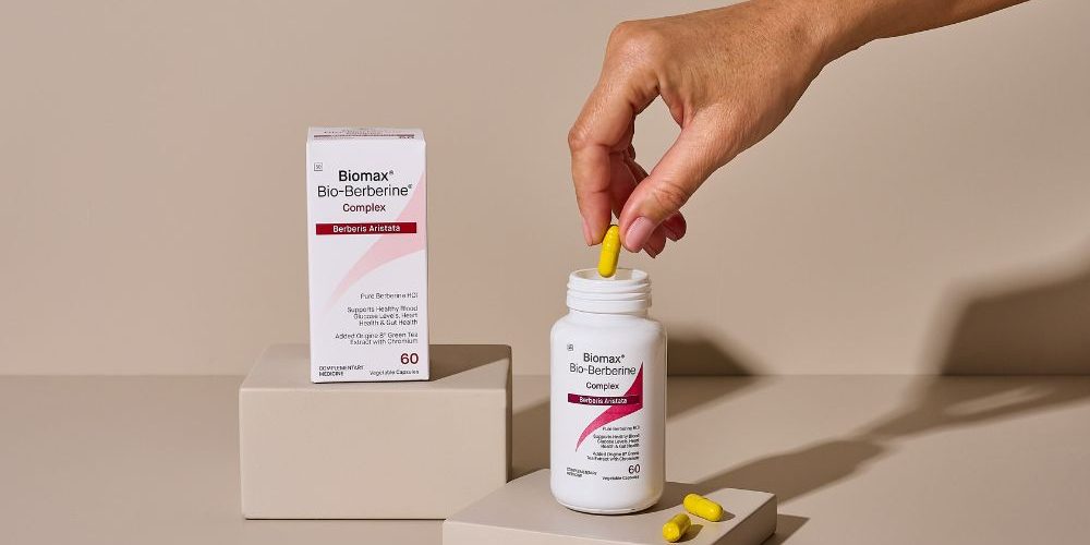 Hand reaching for Biomax® Bio-Berberine® Complex