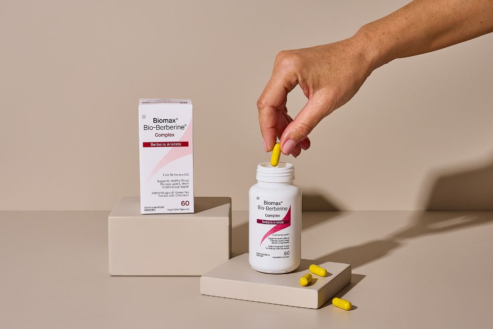 Hand reaching for Biomax® Bio-Berberine® Complex