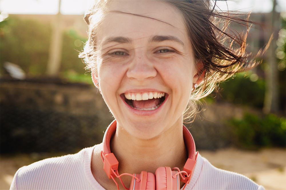 Smiling, sun-kissed woman