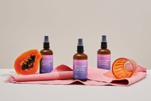 FtN Lubricant styled with an open papaya